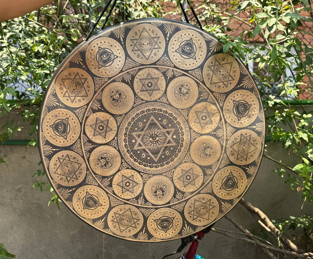 Nepalese handcrafted gong featuring open-eye sacred patterns