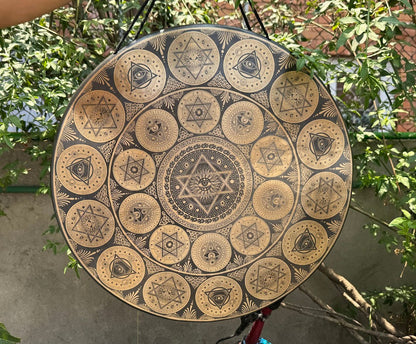 Nepalese handcrafted gong featuring open-eye sacred patterns