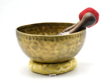 Nine-inch Himalayan meditation bowl displayed on its cushion